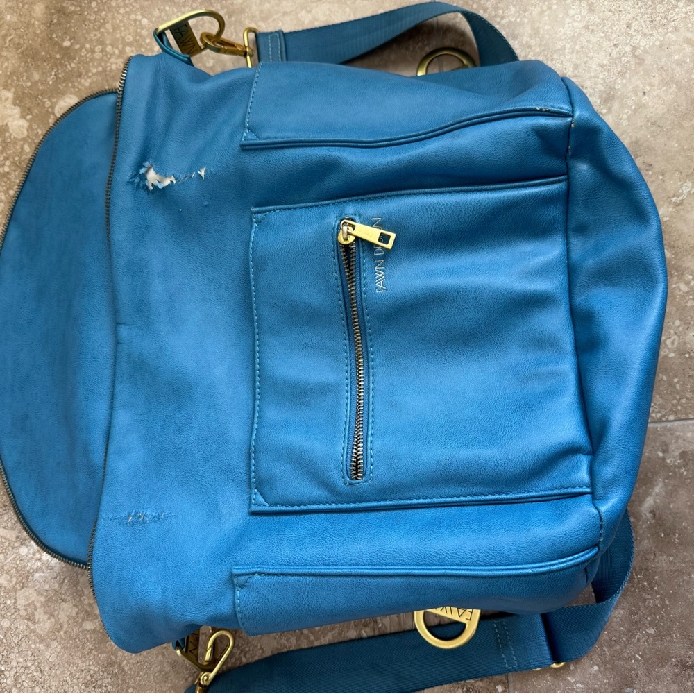 Fawn Design Blue Leather Backpack with Gold Accents